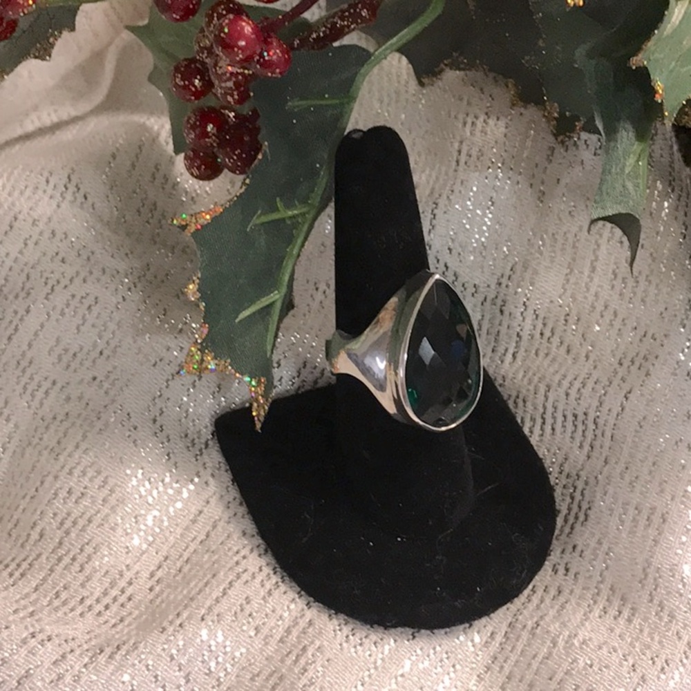 Lovely .925 sterling silver and faceted green chrome diopside glass ring.